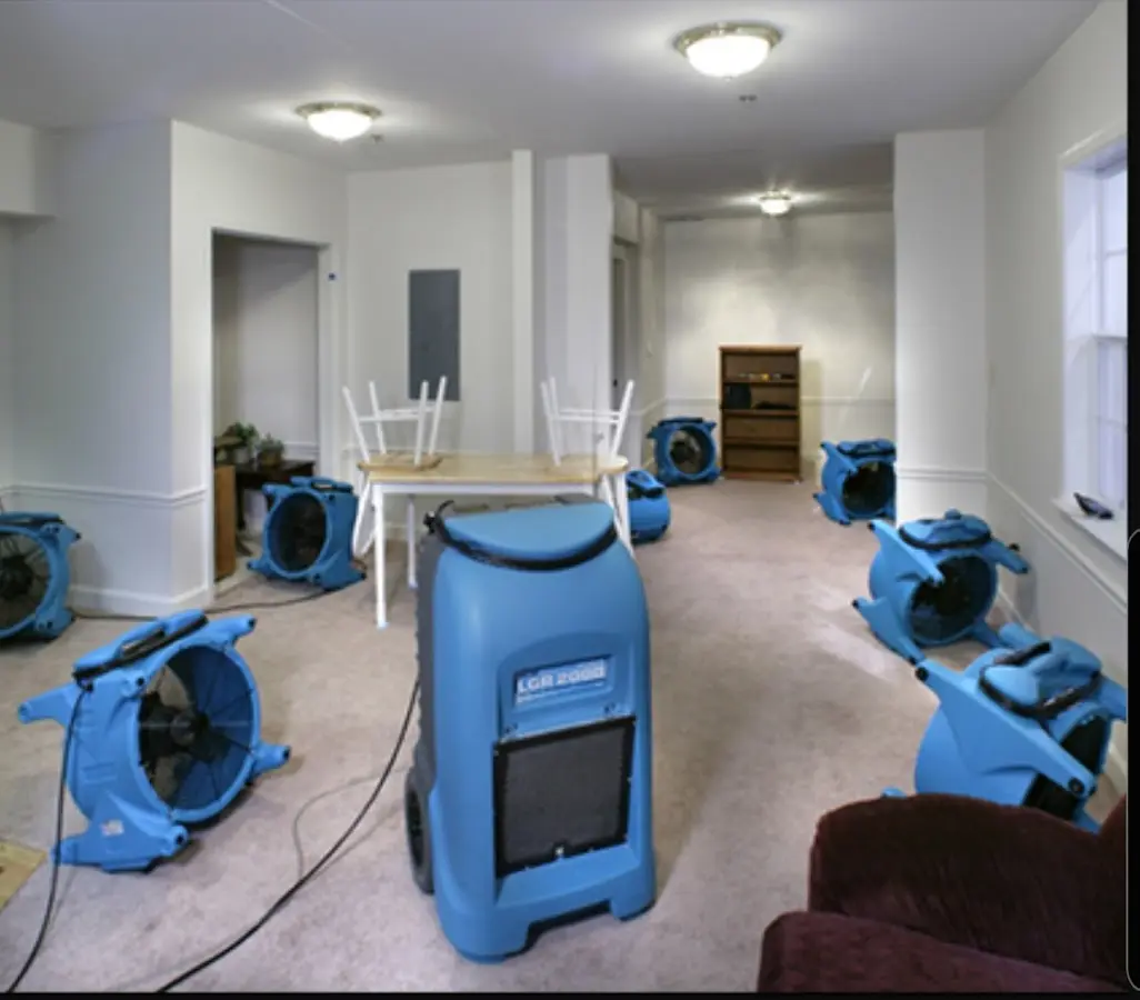 Air movers and dehumidifier setup for Water Extraction & Removal in Heartland